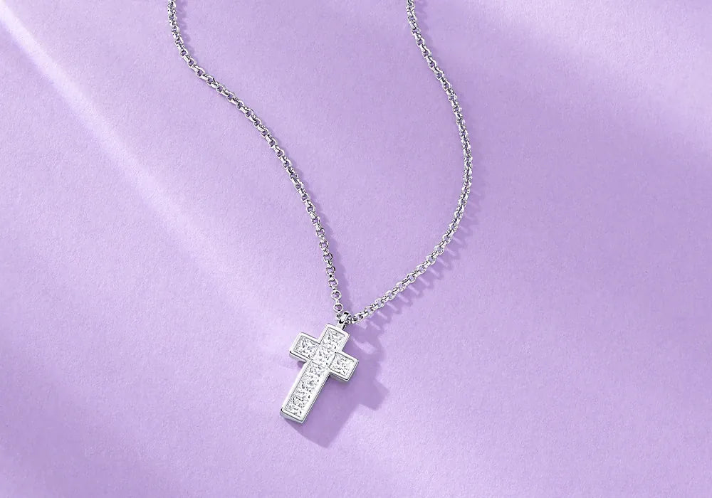APM Monaco Cross Necklace on Lila Background