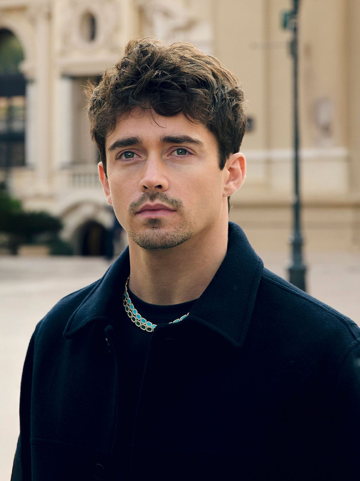 APM Monaco x Charles Lagoon wearing Malachite and lagoon Choker outside the monte carlo casino