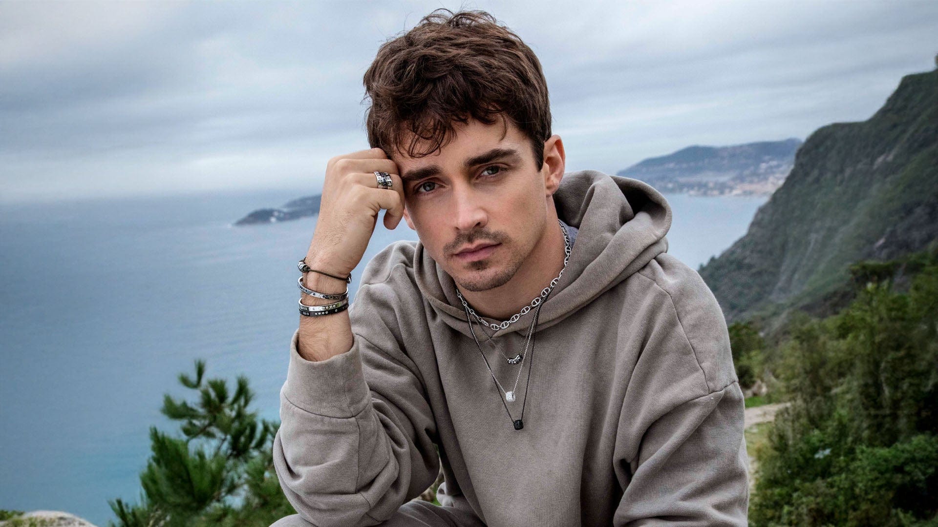 APM Monaco x Charles Leclerc wearing Chain and morse black and silver jewelry