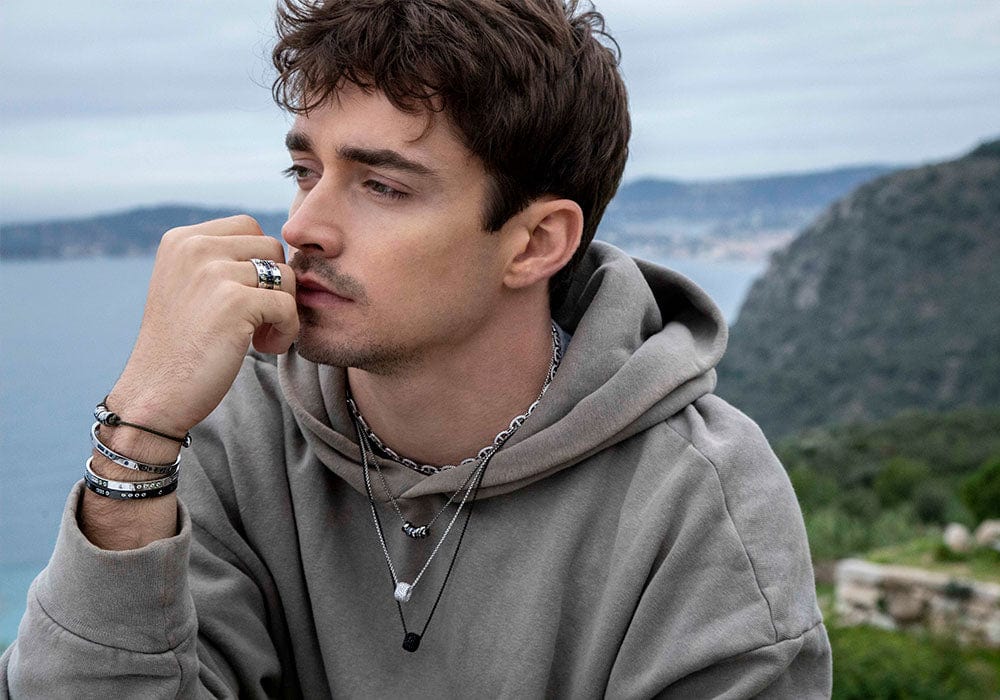 APM Monaco x Charles Leclerc wearing morse and pave black and silver jewelry