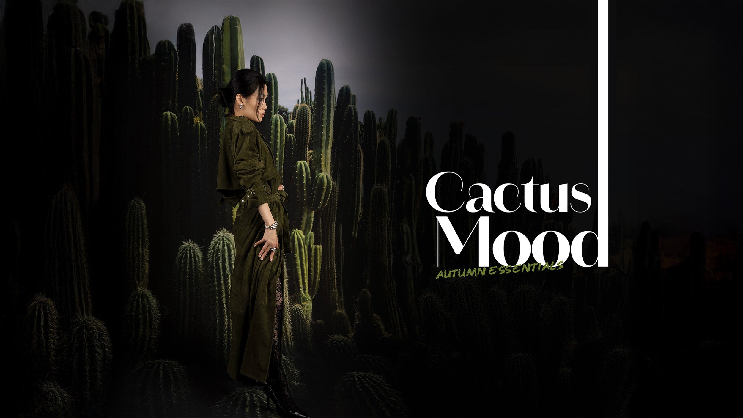 Woman in a dark outfit and APM monaco jewels standing among cacti with 'Cactus Mood' text on a dark background