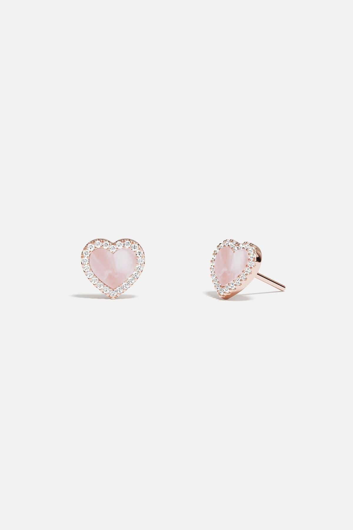 Earrings APM Monaco rose gold heart-stud with pink nacre.