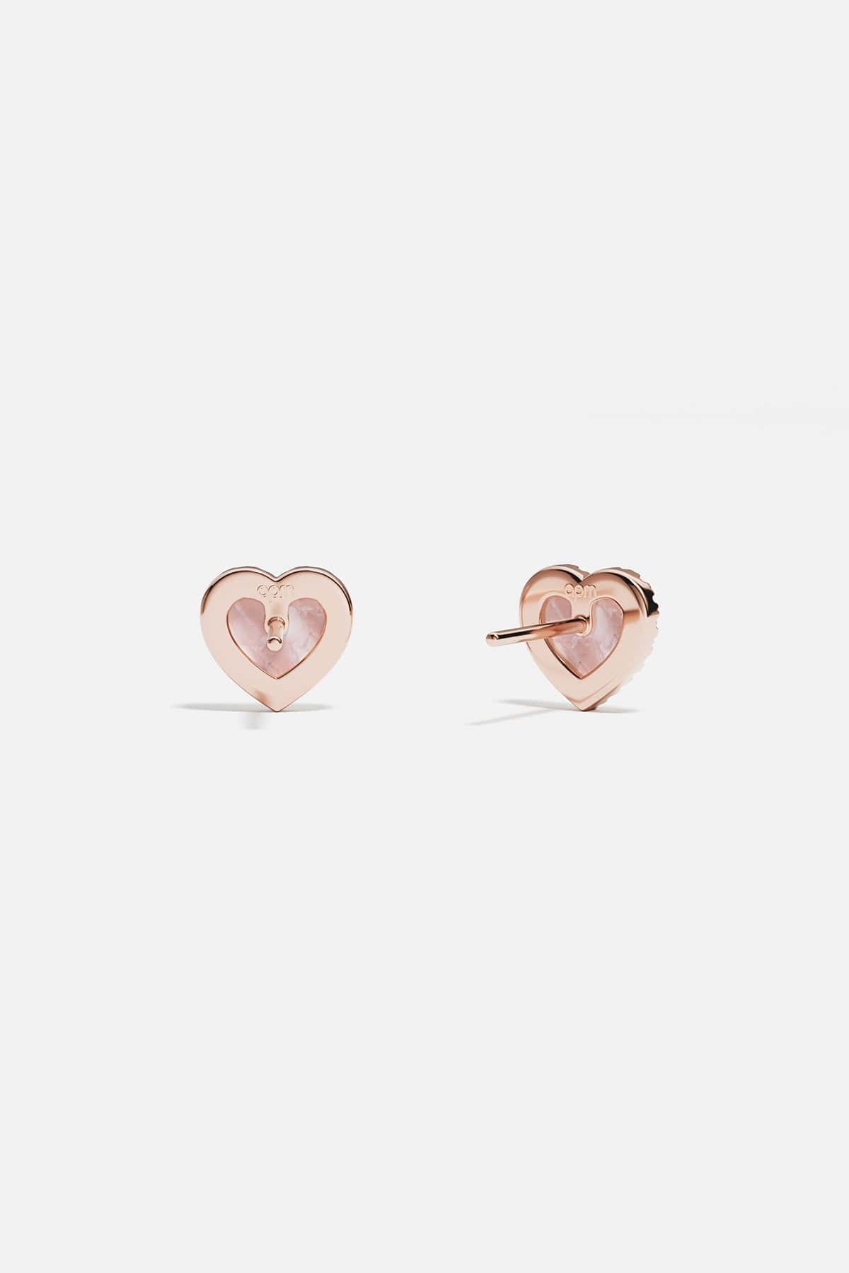 Earrings APM Monaco rose gold heart-stud with pink nacre.