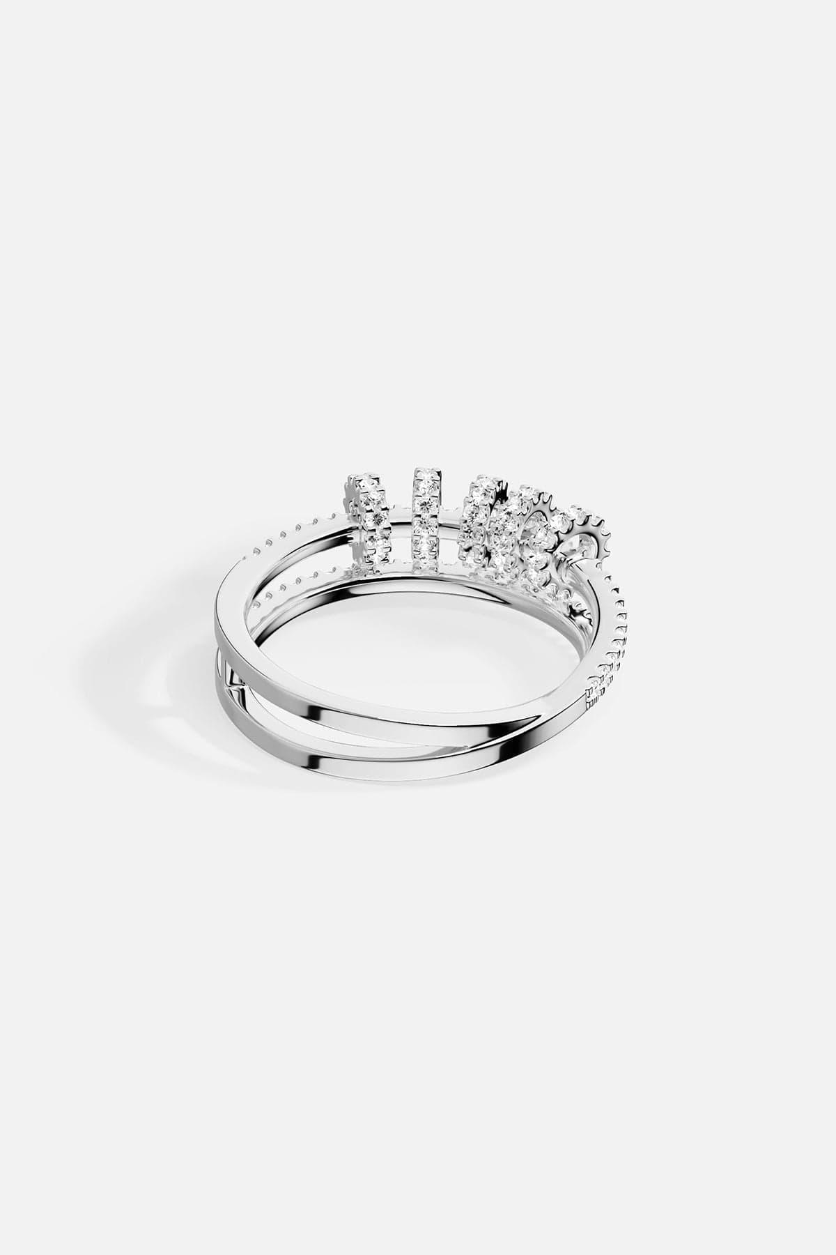 APM Monaco white gold double-ring with sliding hoops and pavé stones.