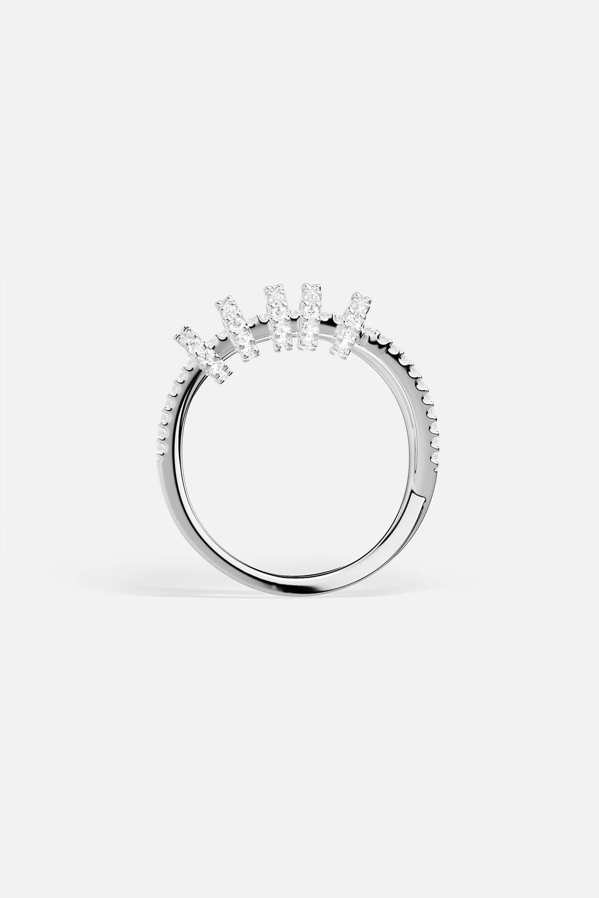 APM Monaco white gold double-ring with sliding hoops and pavé stones.