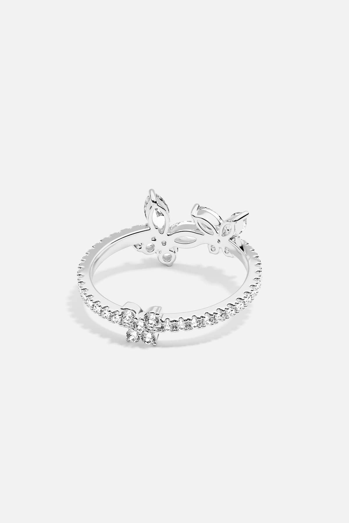 alloy ring with white stones accents on a white background