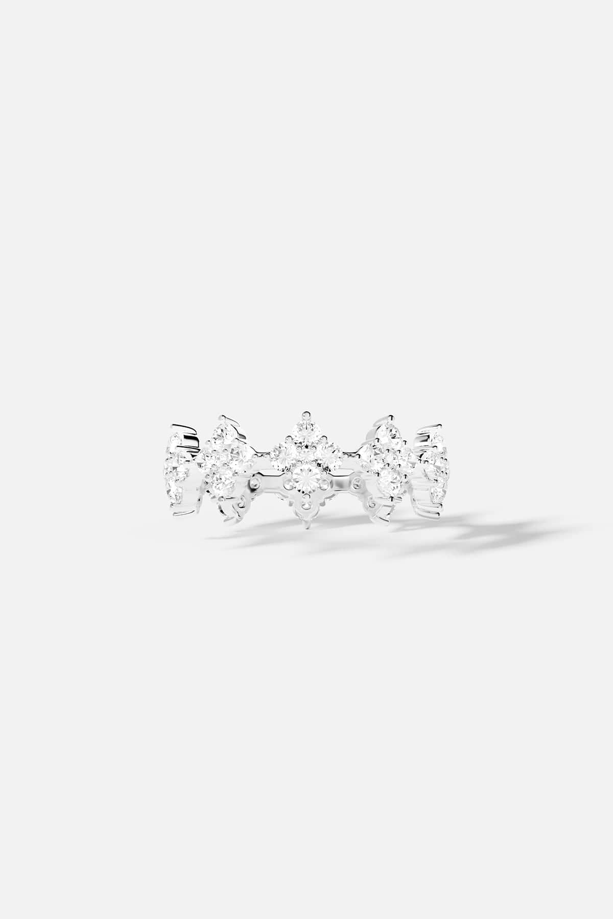 Rings APM Monaco fashion jewelry; pavé ring with clear white stones on a metal band.