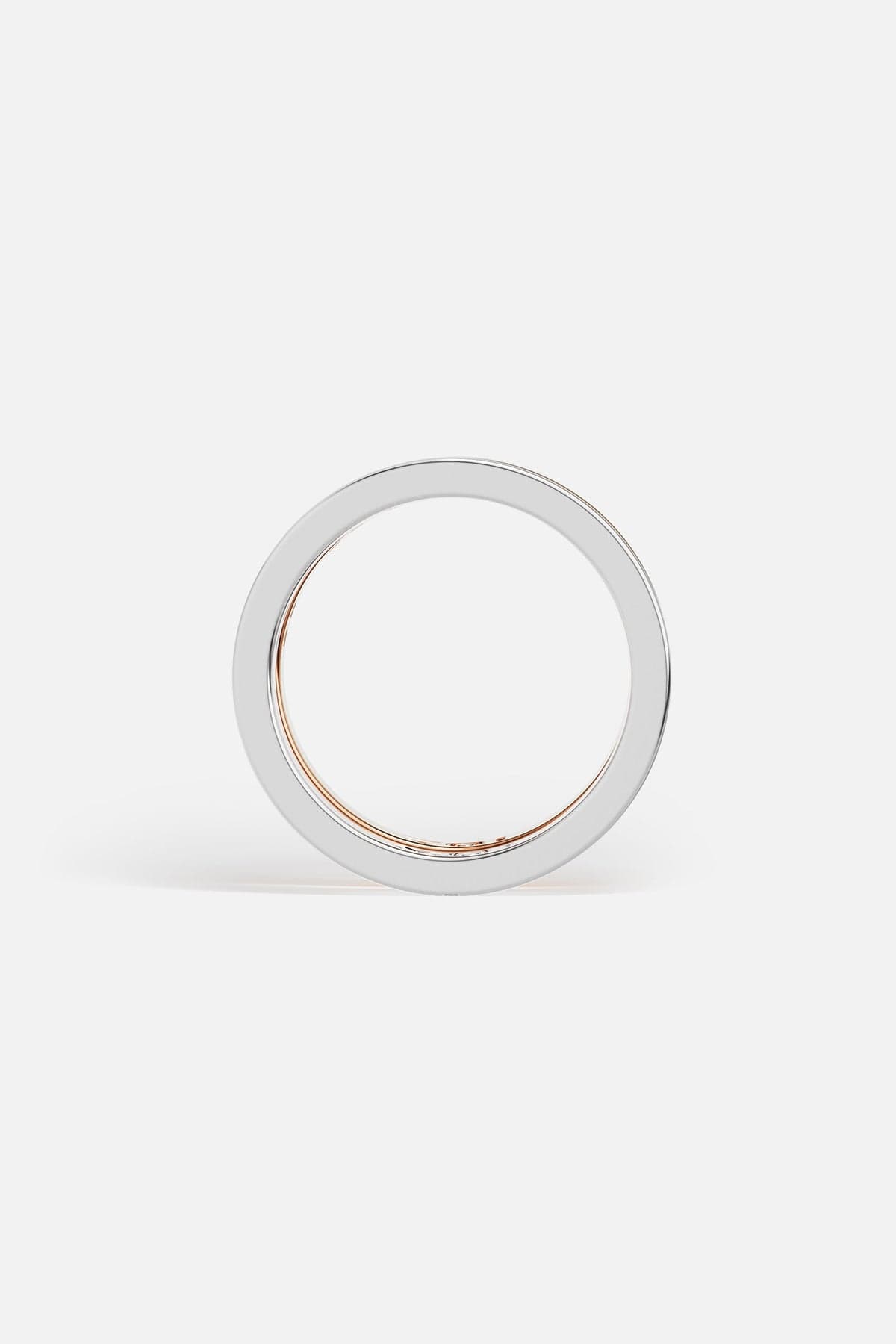 Rings APM Monaco: three stacked rings in white metal with MOI, rose gold with TOI, and yellow gold with white cubic zirconia.