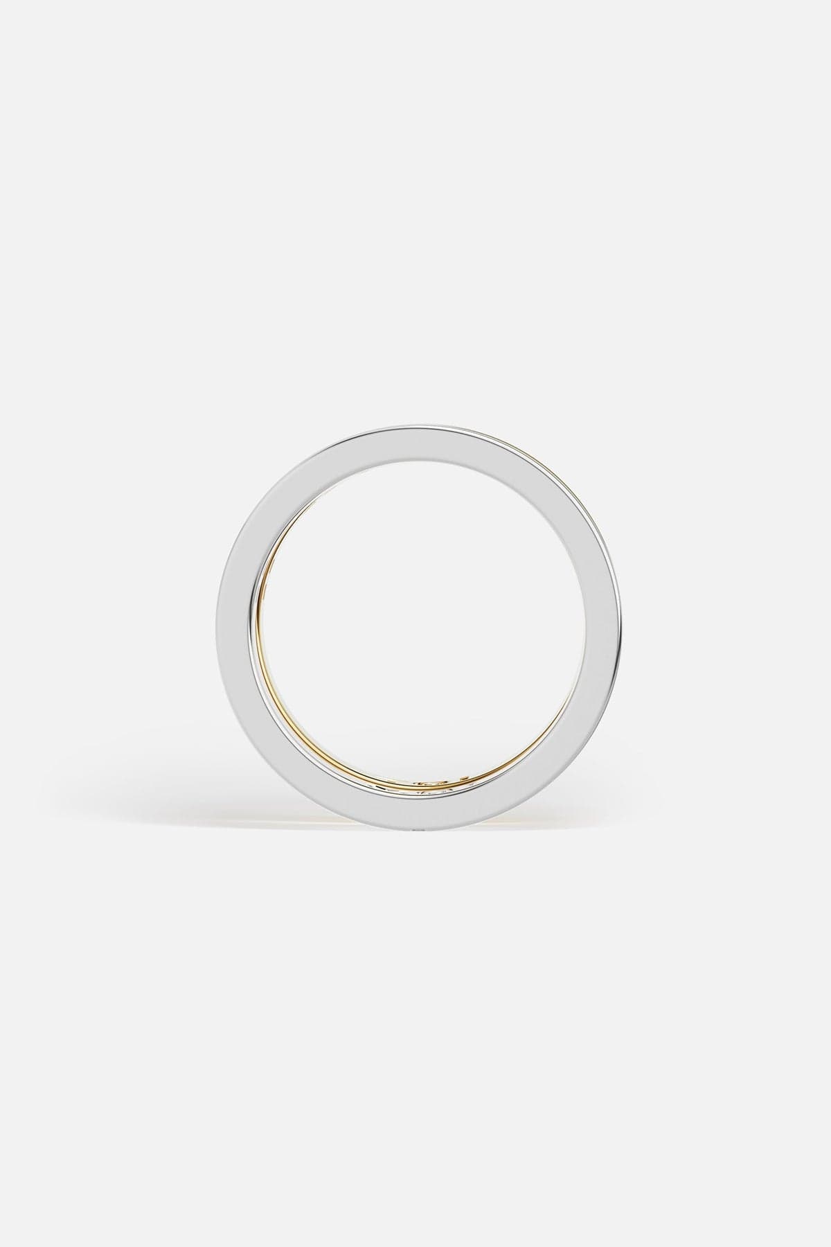 Rings APM Monaco: two stacked rings, yellow gold and white gold, white cubic zirconia, one with MOI engraving.