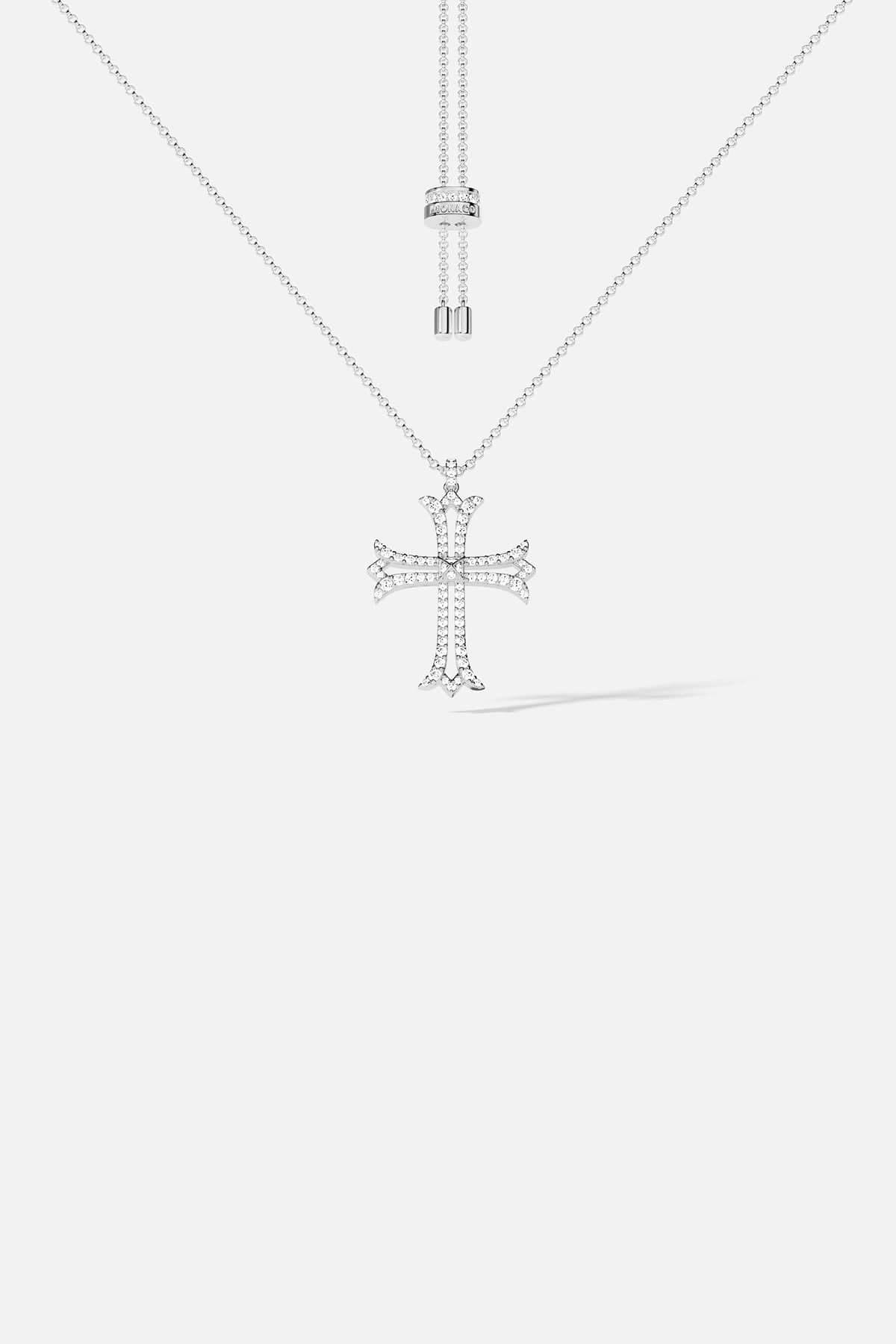 cross pendant necklace on a white background