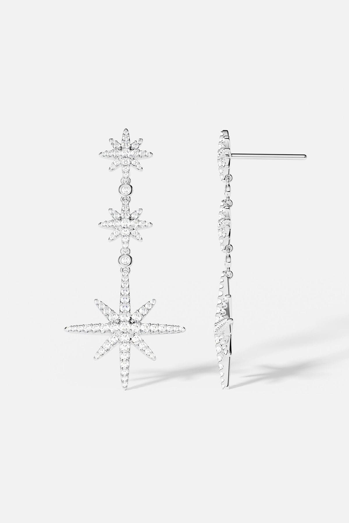 Earrings APM Monaco: silver-tone triple meteorites drop earrings with cubic zirconia.