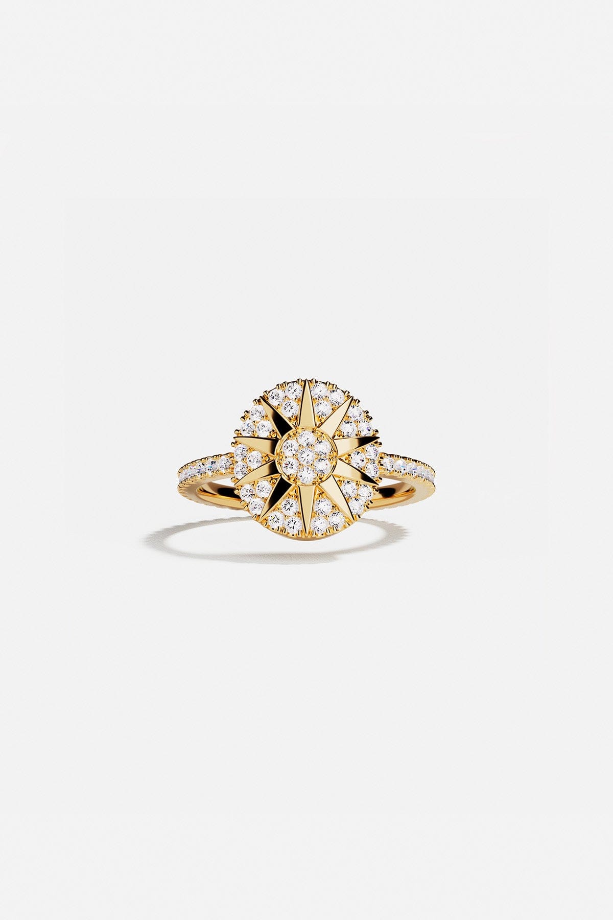 Rings APM Monaco, yellow gold pavé ring with a star motif encrusted with small diamonds.