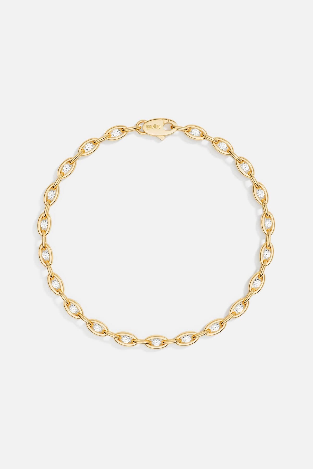 Bracelets APM Monaco, yellow gold pavé chain bracelet with small diamonds between each oval link.