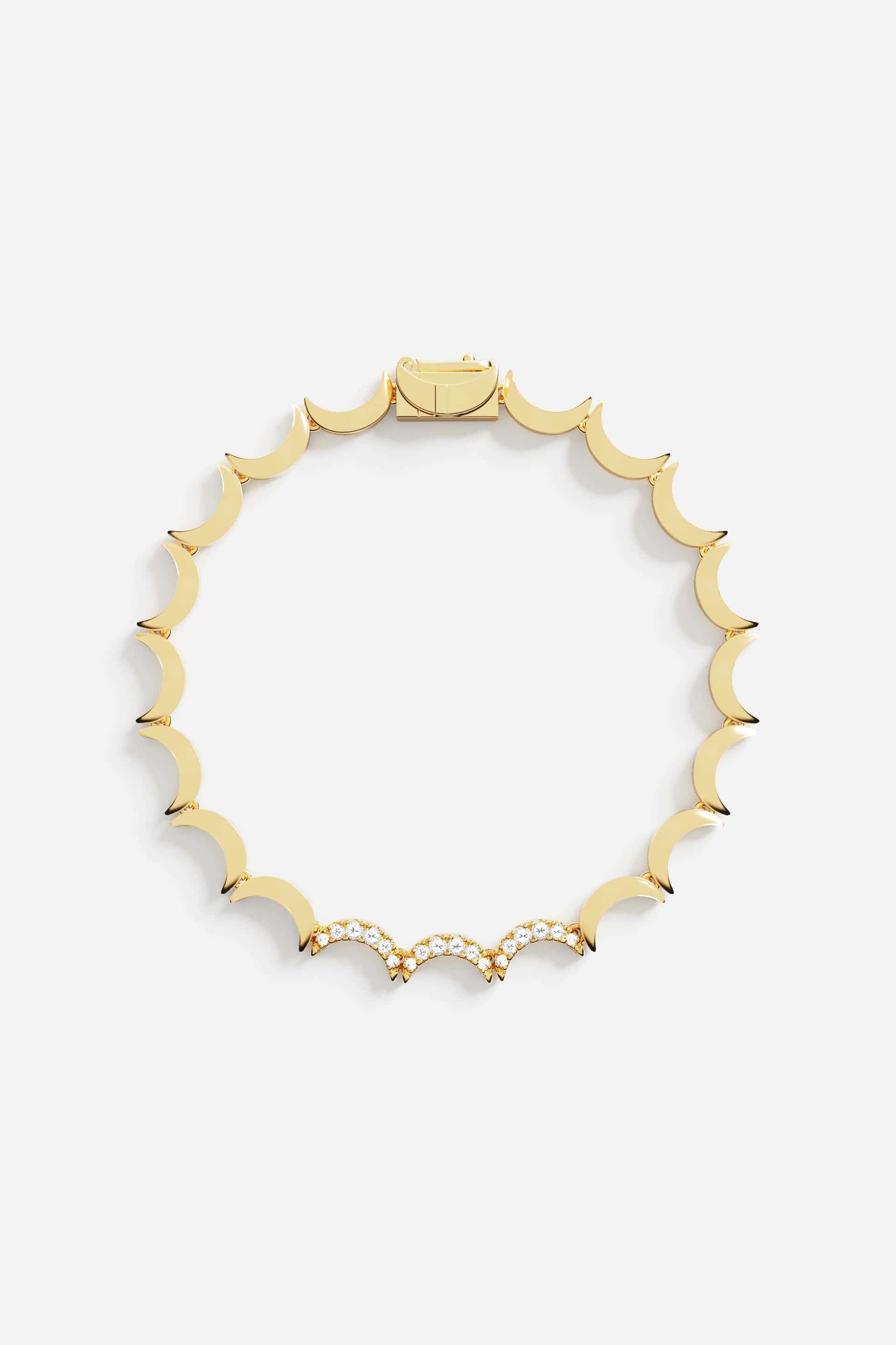 Bracelets APM Monaco, yellow gold tone, wavy bracelet design with a smooth, minimalist look; no visible stones.