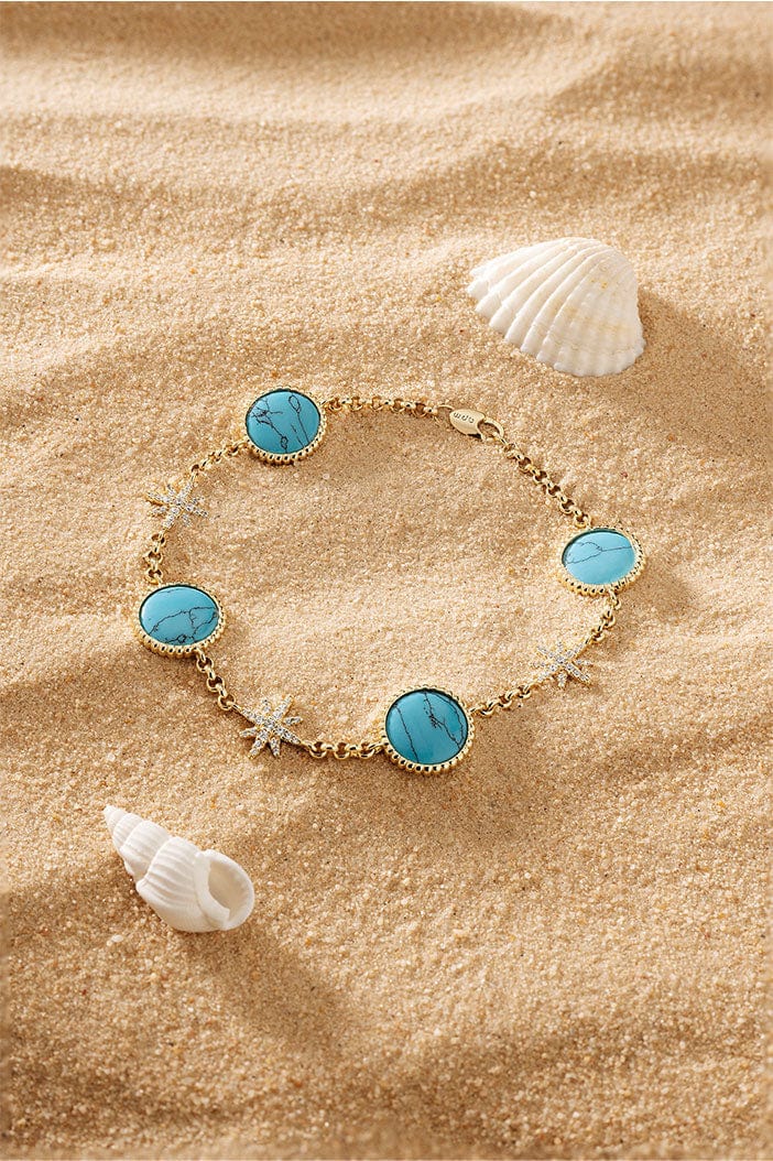 APM Monaco Lagoon Météorites Bracelet in Yellow Gold on soft sand