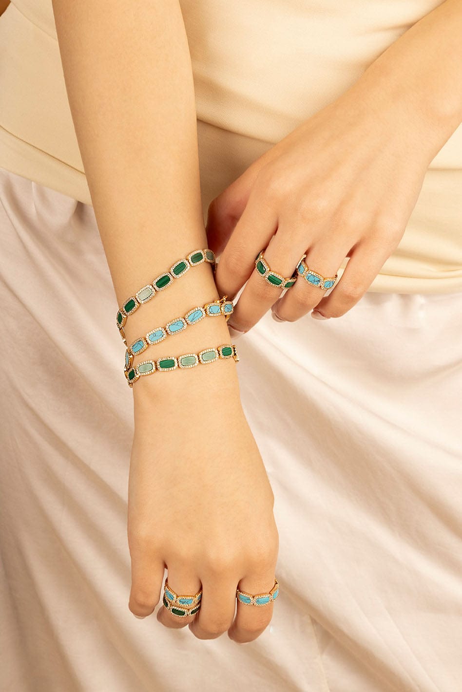 APM Monaco Malachite Bracelet in Yellow Gold worn on hand