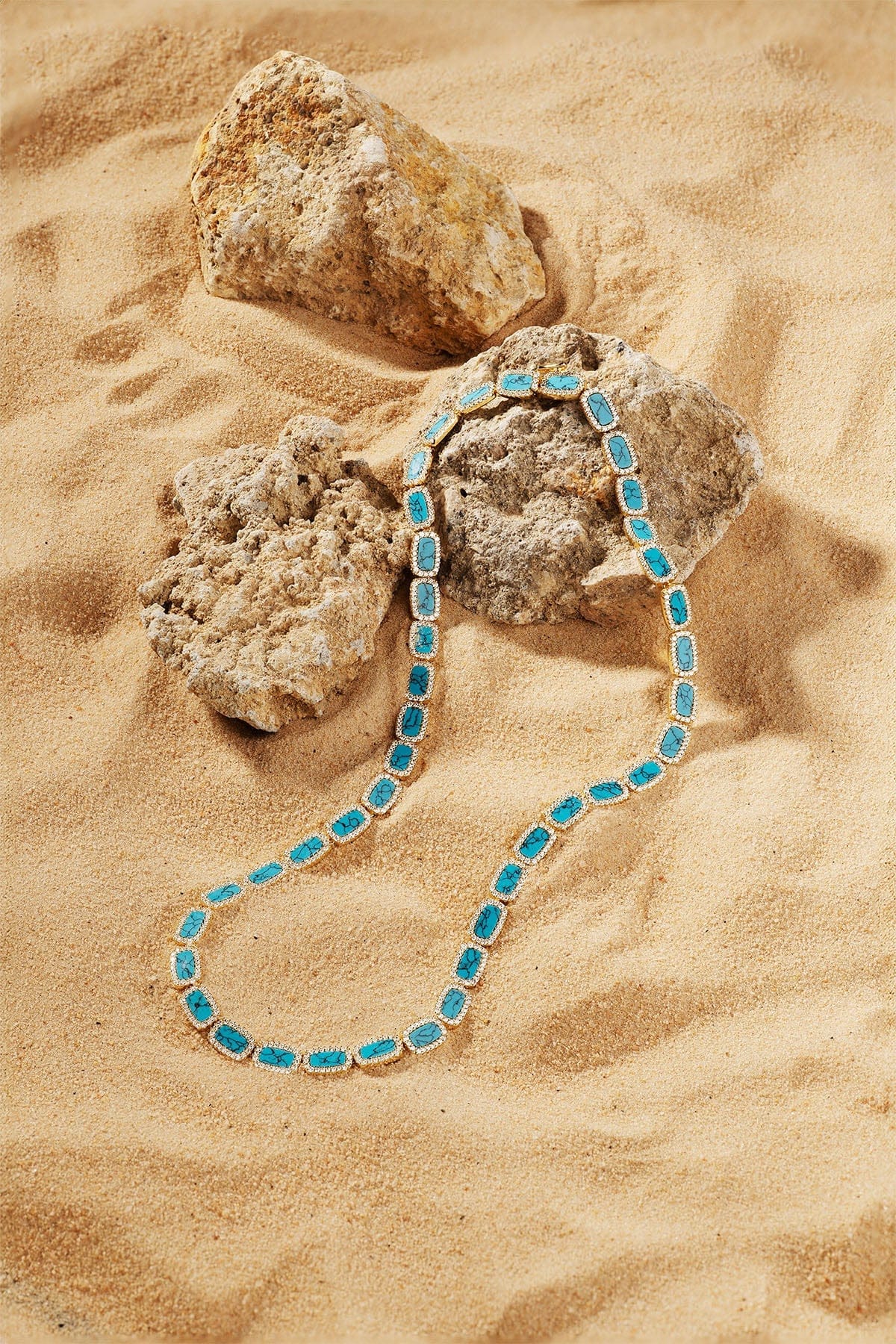 Necklaces APM Monaco choker with rectangular lagoon turquoise stones in yellow gold.