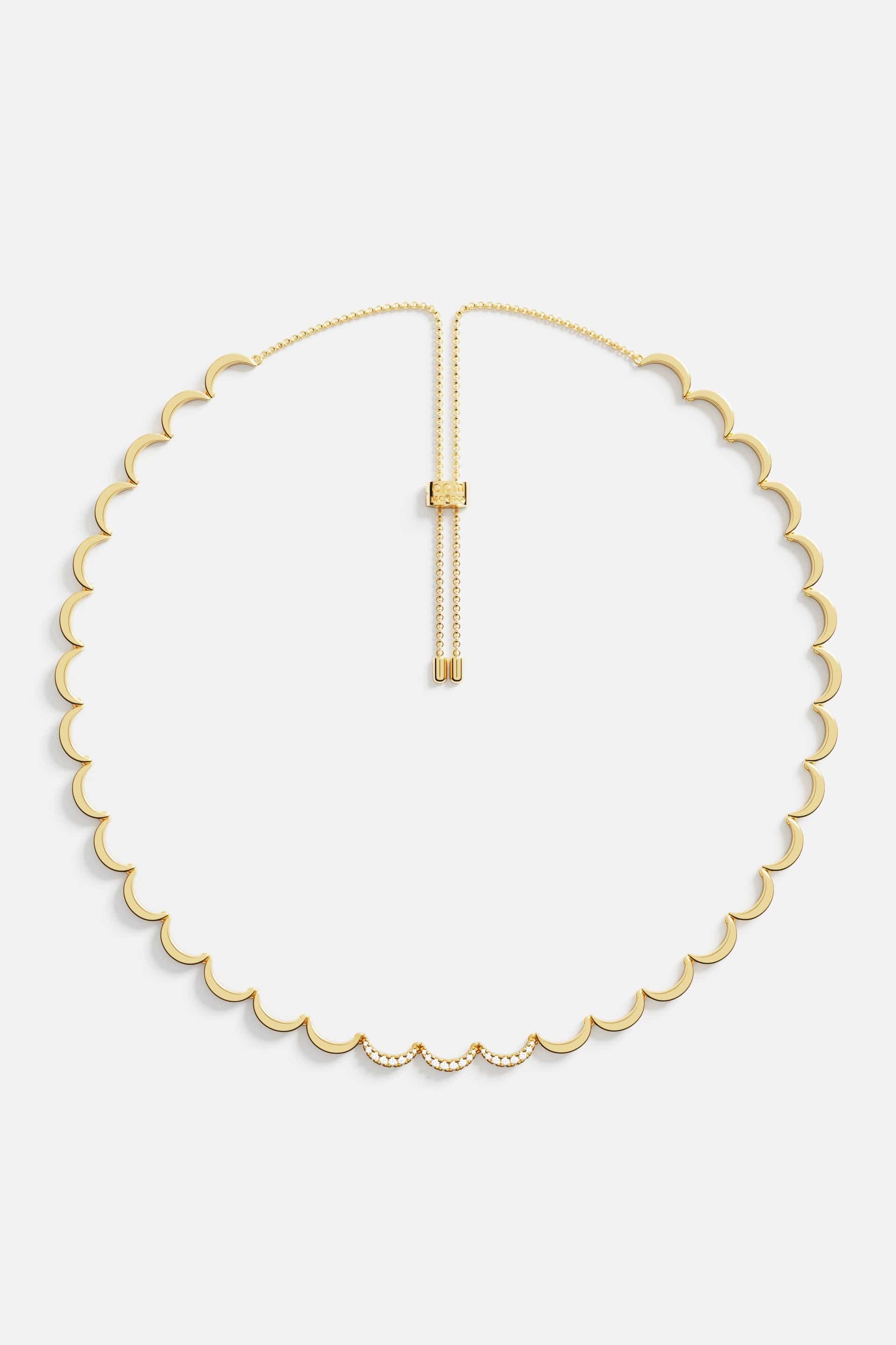 Necklaces APM Monaco, yellow gold adjustable necklace with a wavy scalloped design.
