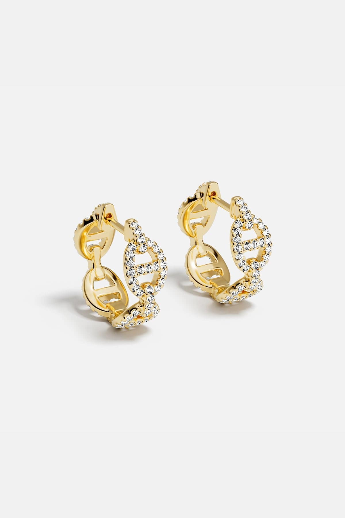 Earrings APM Monaco yellow gold maille marine hoop with white cubic zirconia.