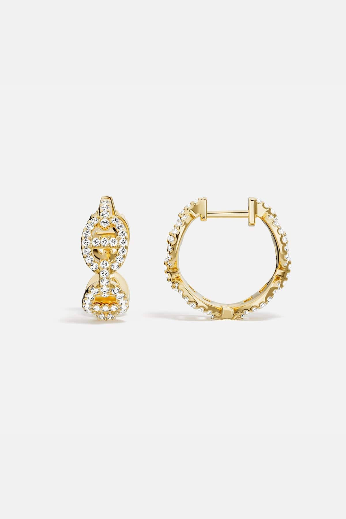 Earrings APM Monaco yellow gold maille marine hoop with white cubic zirconia.