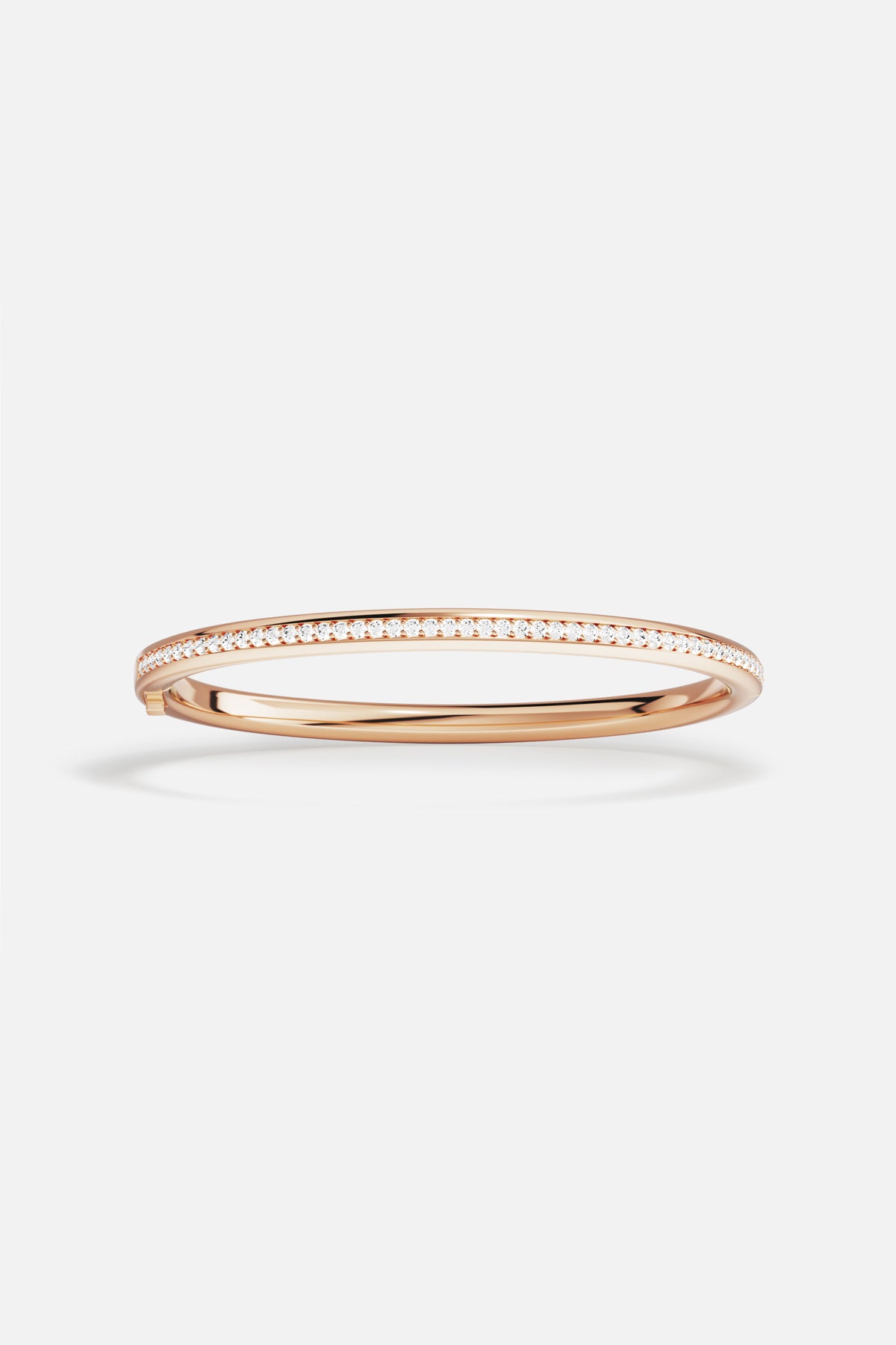 APM Bangle in rose color, a sleek shimmer for effortless elegance.