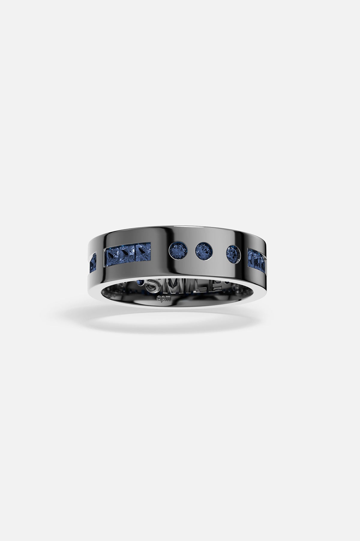 APM Ring in dark rhodium finish with deep blue stones, boldly modern.