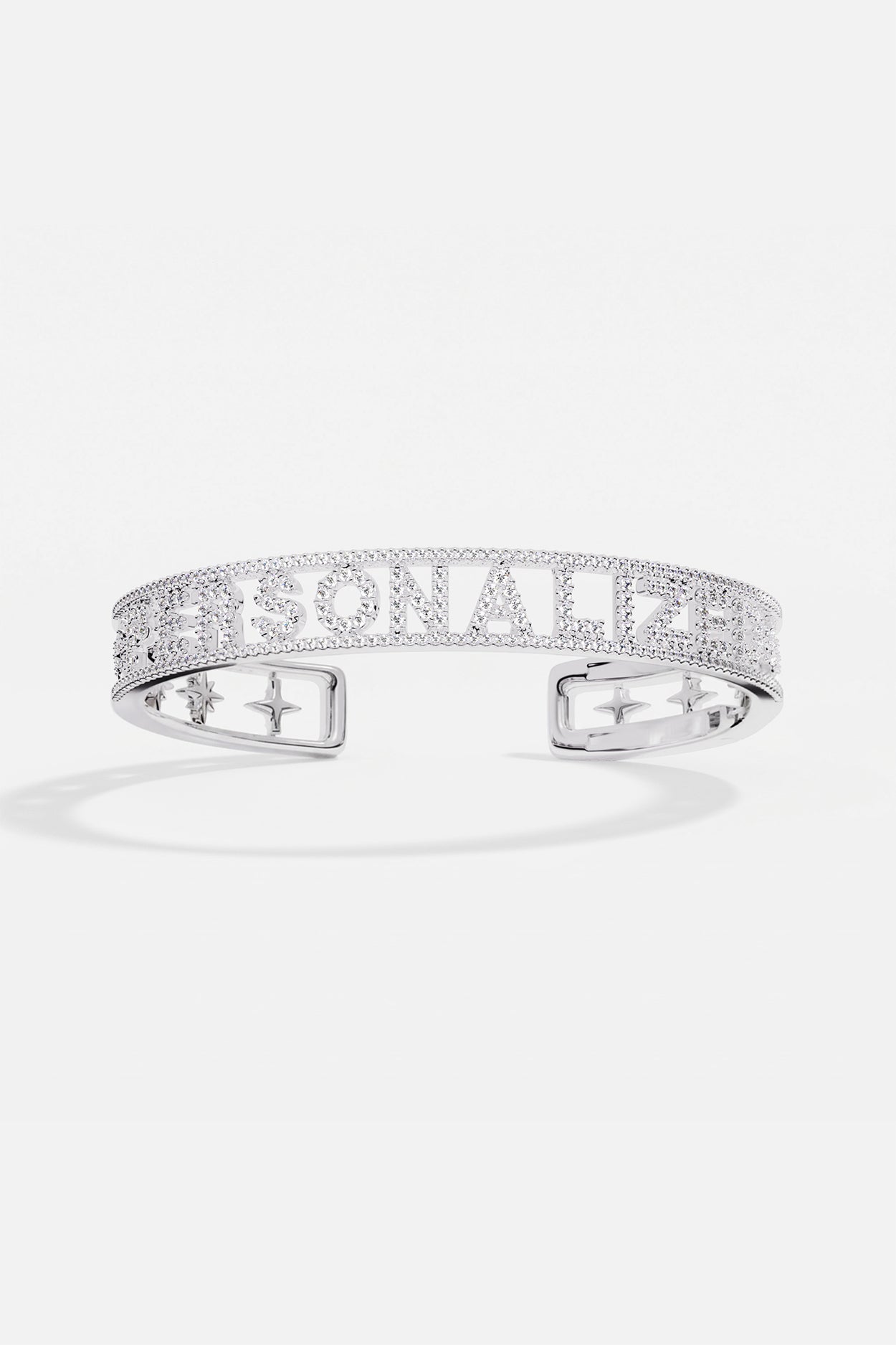 APM Monaco personalized cuff, rhodium finish sparkling with starlit charm and modern elegance.