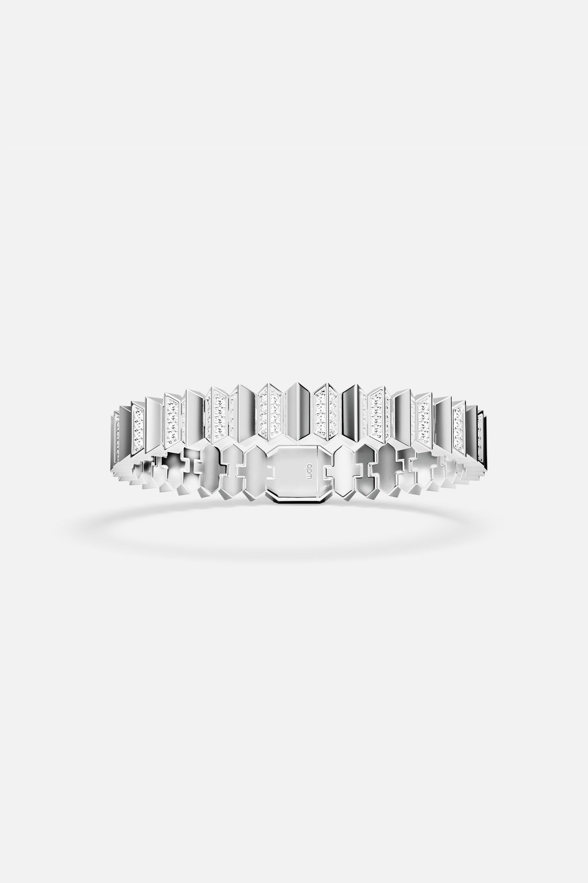 APM Bracelet in rhodium finish, sculpted architectural edges shimmering with modern audacity.