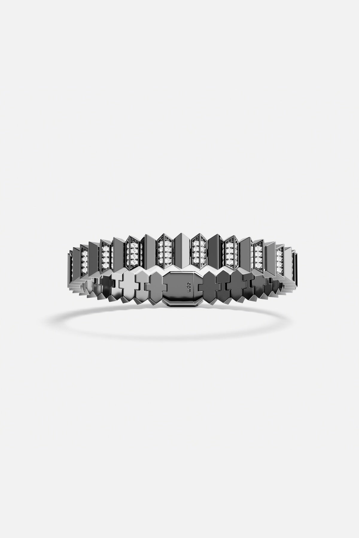 APM Bracelet in rhodium finish, sharp architectural edges meeting quiet urban confidence.