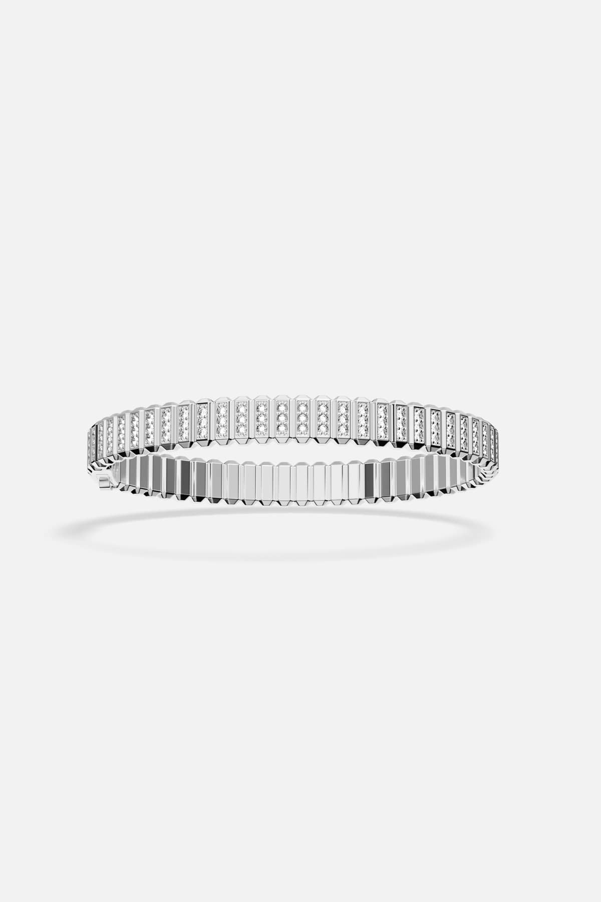APM Bracelet in rhodium finish, ridged brilliance wrapping the wrist with quiet confidence.