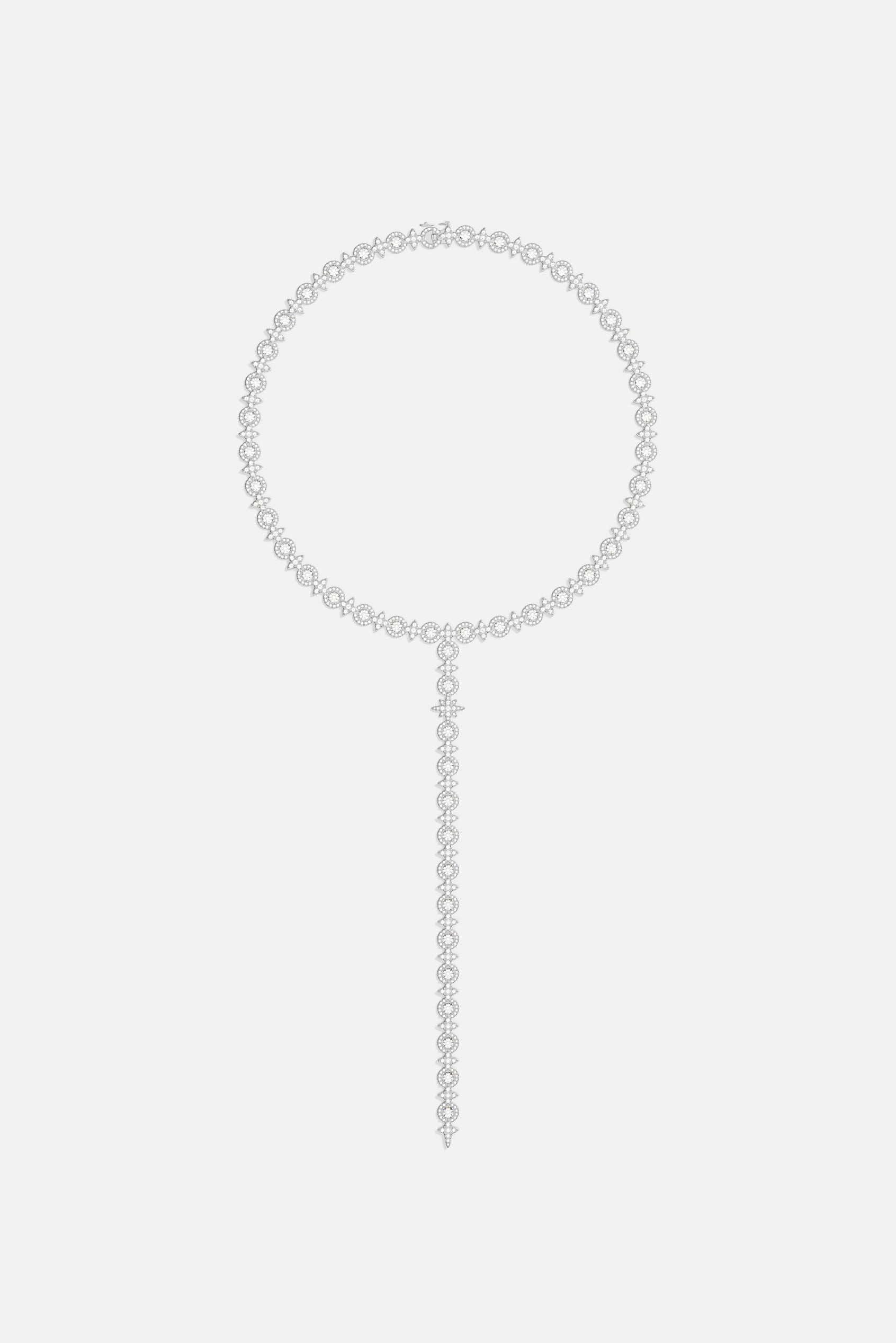 APM Lariat Necklace, a cascading line of light in rhodium finish brilliance.