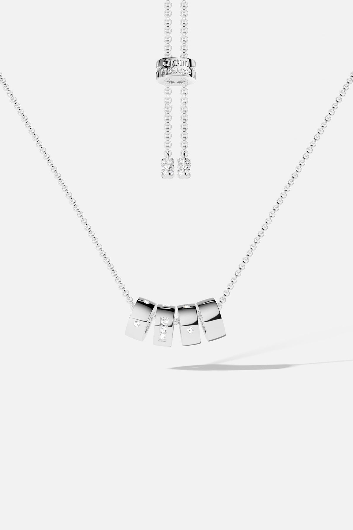 APM Necklace with sliding charms, a rhodium finish glow of effortless modernity.