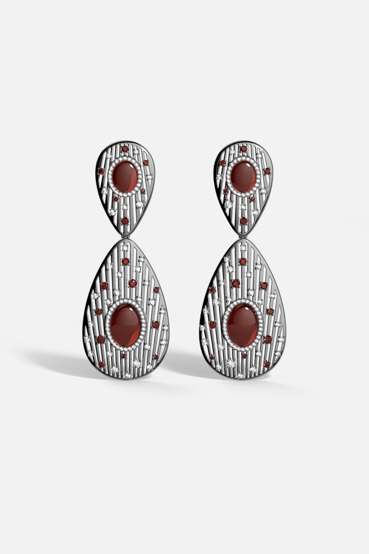 APM Monaco drop earrings, deep red cabochons and starlit sparkle, boldly poetic.
