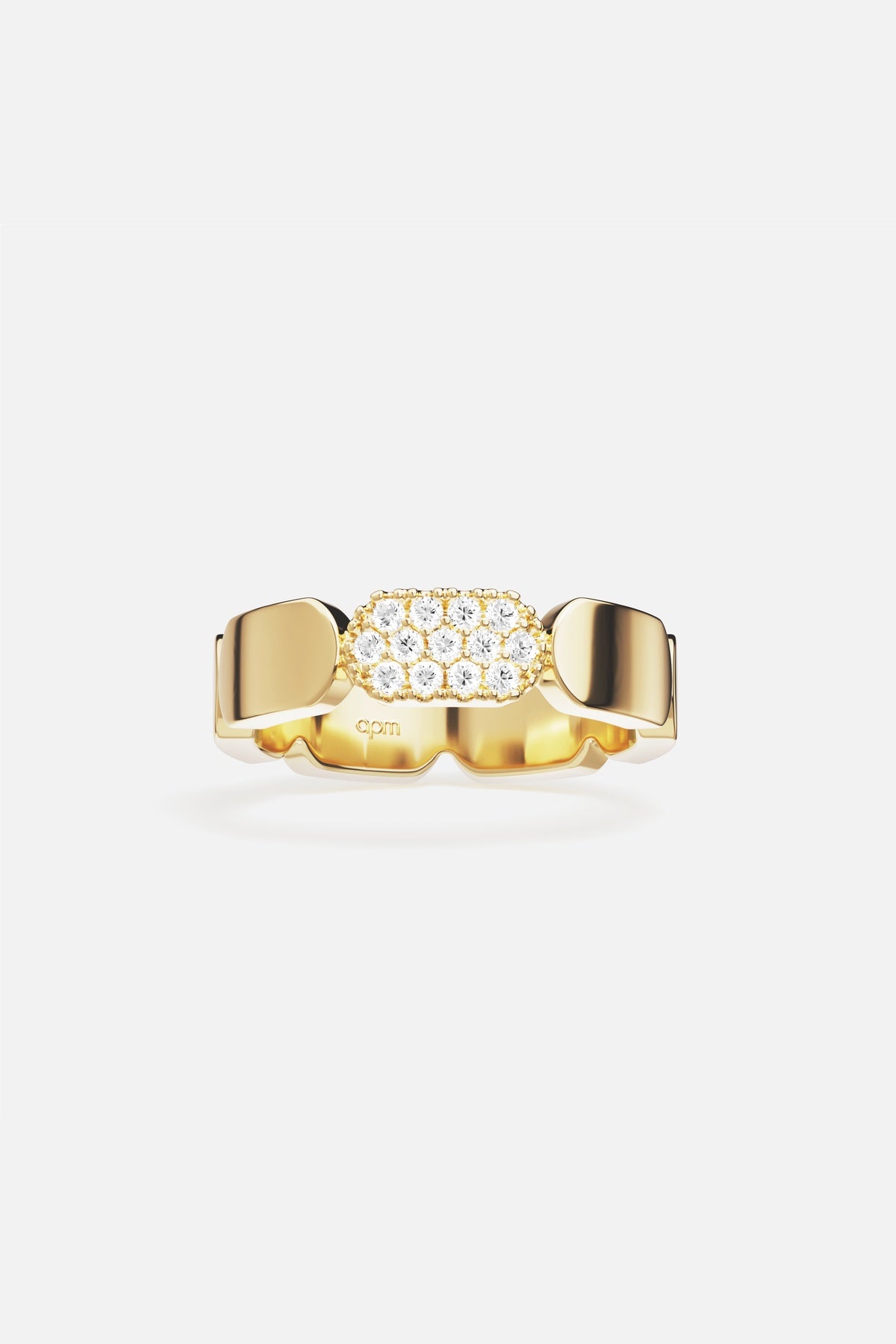 APM Ring in golden hues, bold links meet a shimmering pavé signature.
