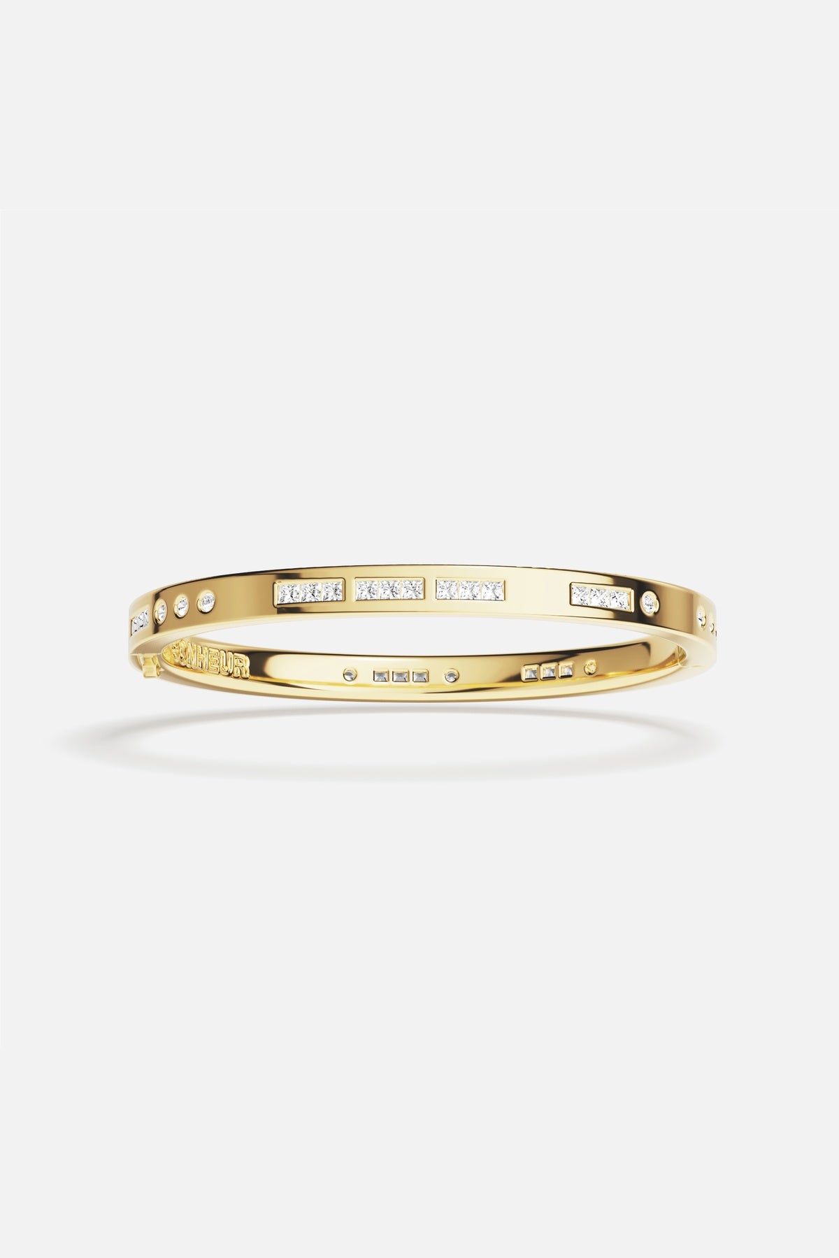 APM Bangle in golden hue, sparkling rhythm meets effortless elegance.