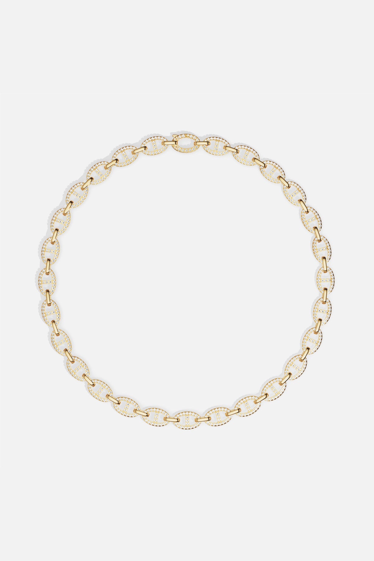 APM Marine Necklace, golden links shimmering with quiet confidence and effortless allure.