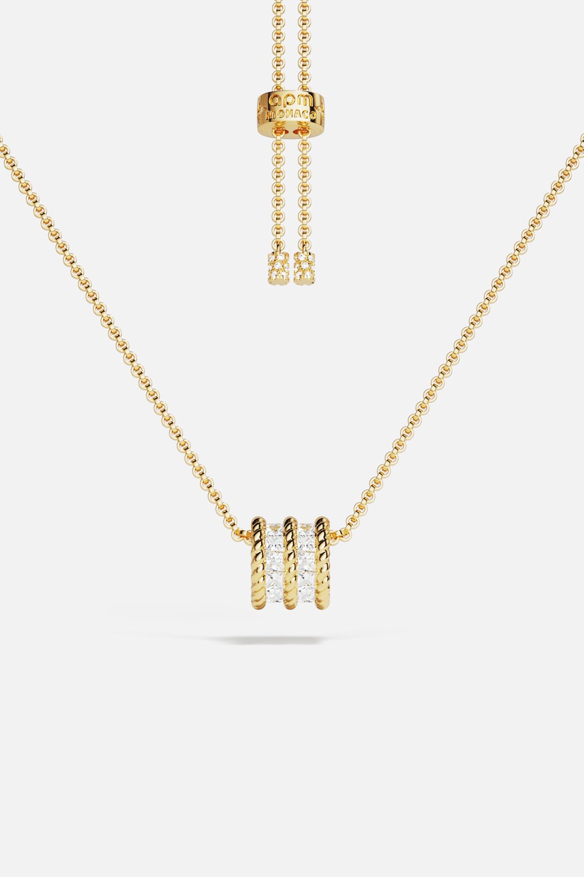 APM Necklace in golden hues, a luminous charm of effortless elegance.
