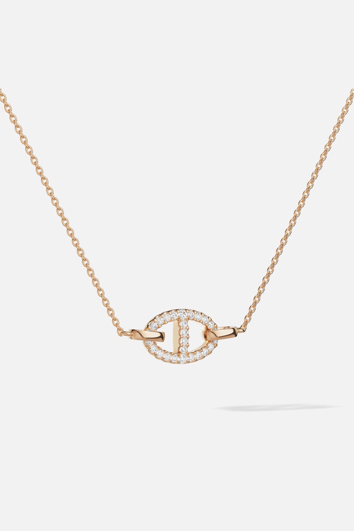 APM Necklace in warm rose color, a delicate link sparkling with quiet elegance.