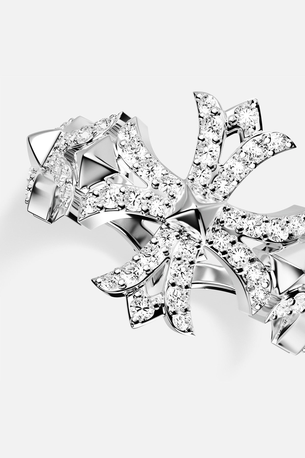 APM Monaco ring, a sparkling burst of stars in rhodium finish brilliance.