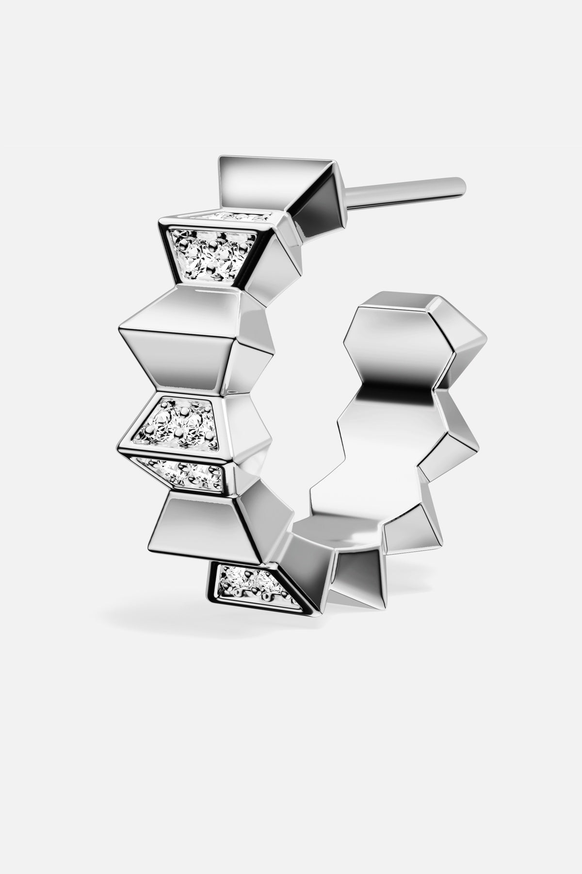 APM Monaco hoop earring in rhodium finish, sculpted geometry with a modern edge.