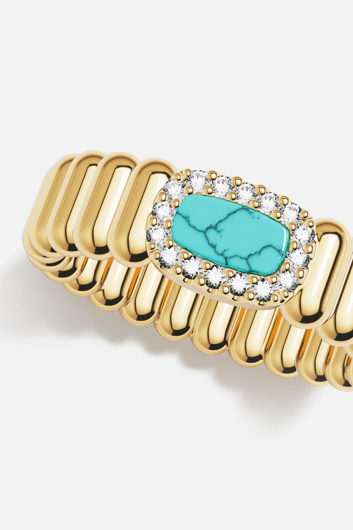 APM Ring in gold color, a turquoise centerpiece framed in sparkling elegance.