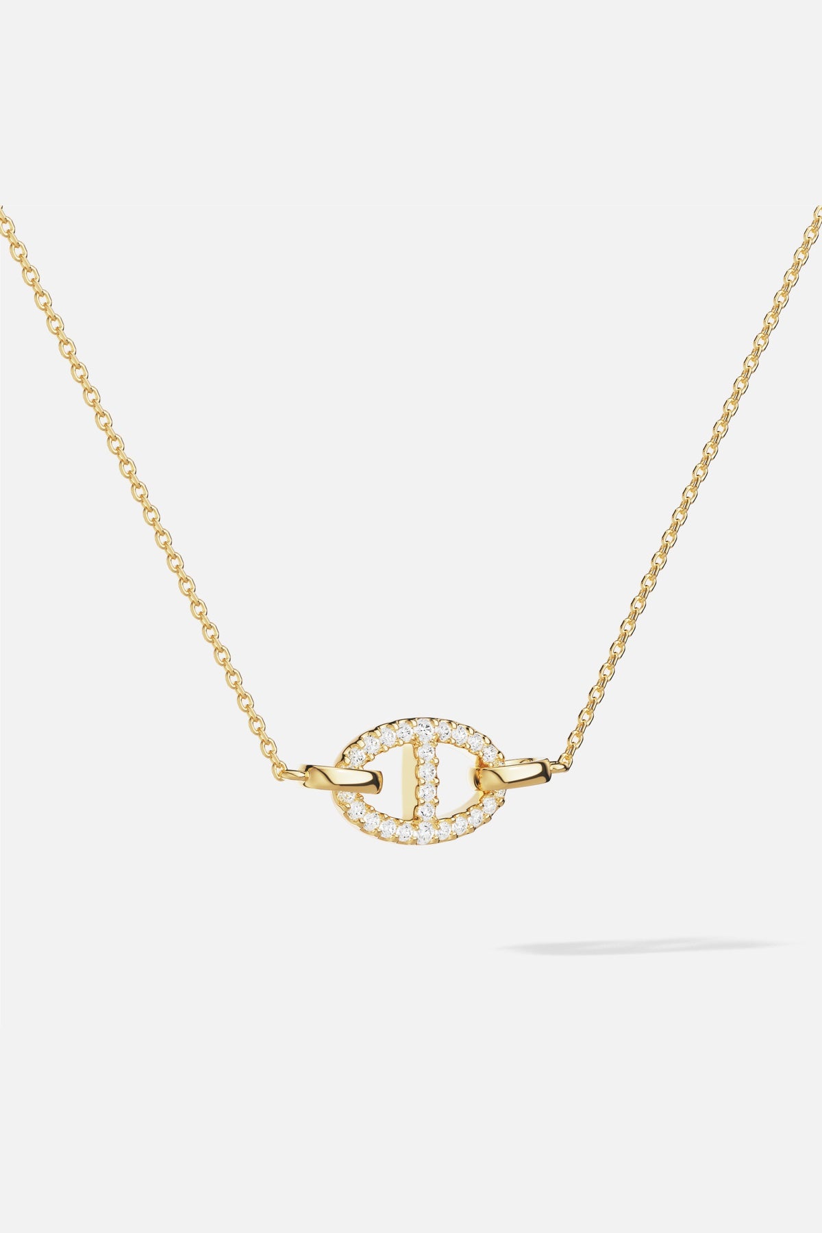 APM Morse Necklace, a golden signature glowing with quiet Riviera charm.