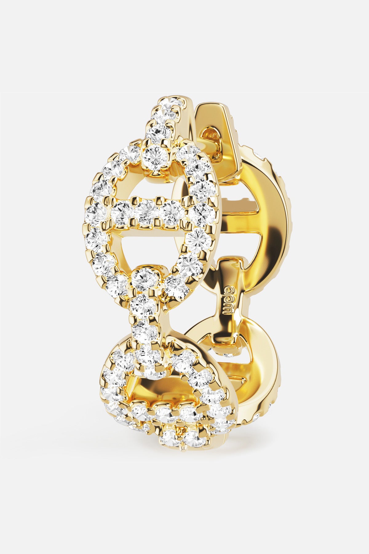 APM Morse Hoop Earrings in a golden shade, radiant sparkle for effortless allure.