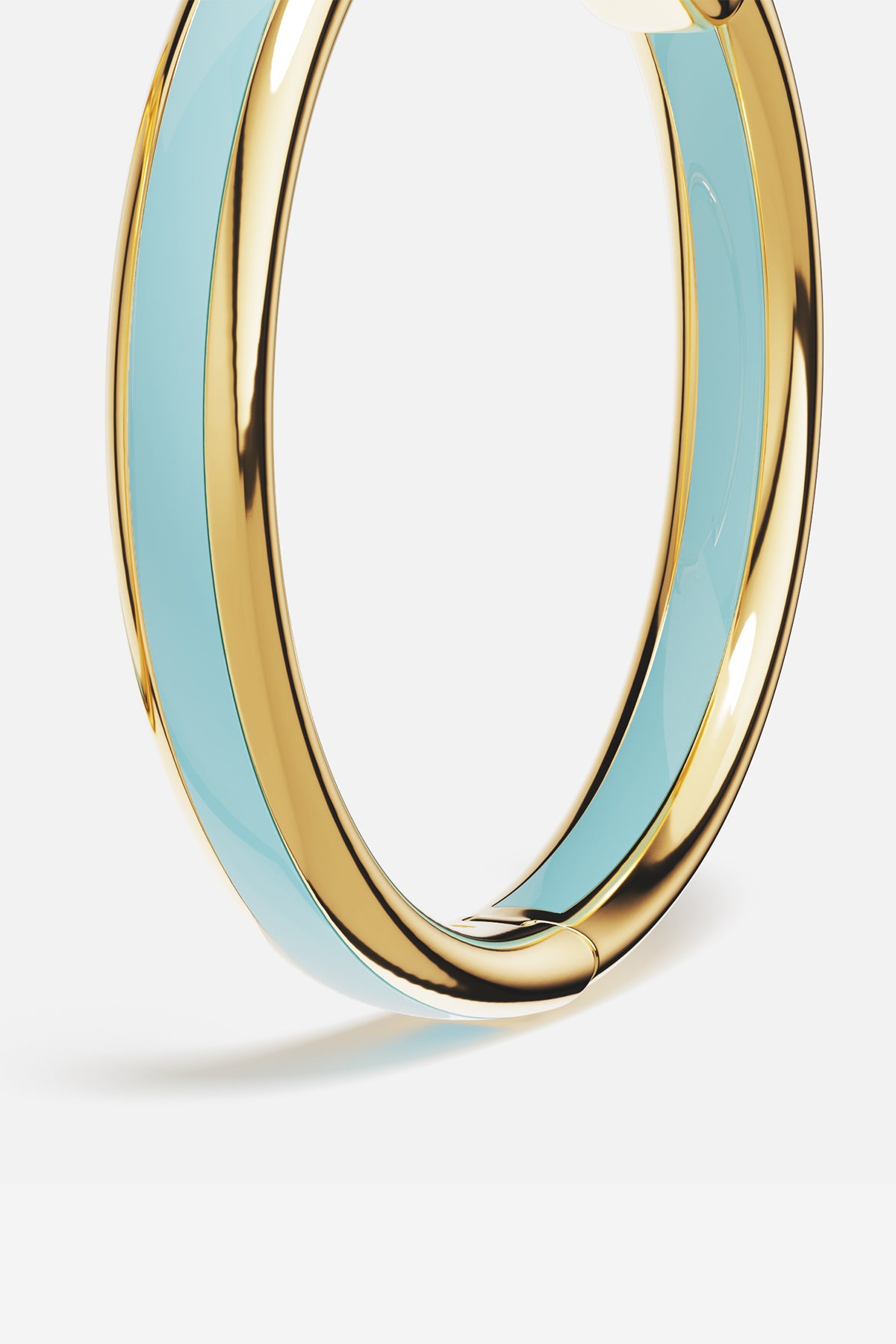 APM Hoop Earring in golden hue and soft blue, a breezy whisper of summer.