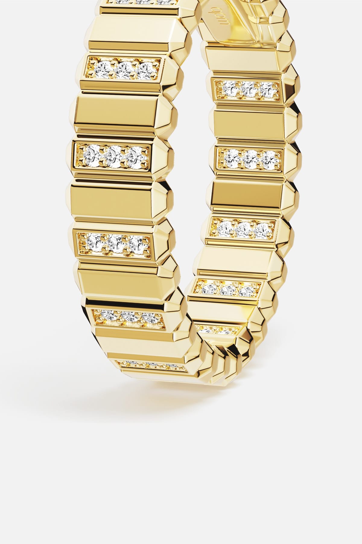 APM Hoop Earrings in golden color, faceted architecture with a radiant modern edge.