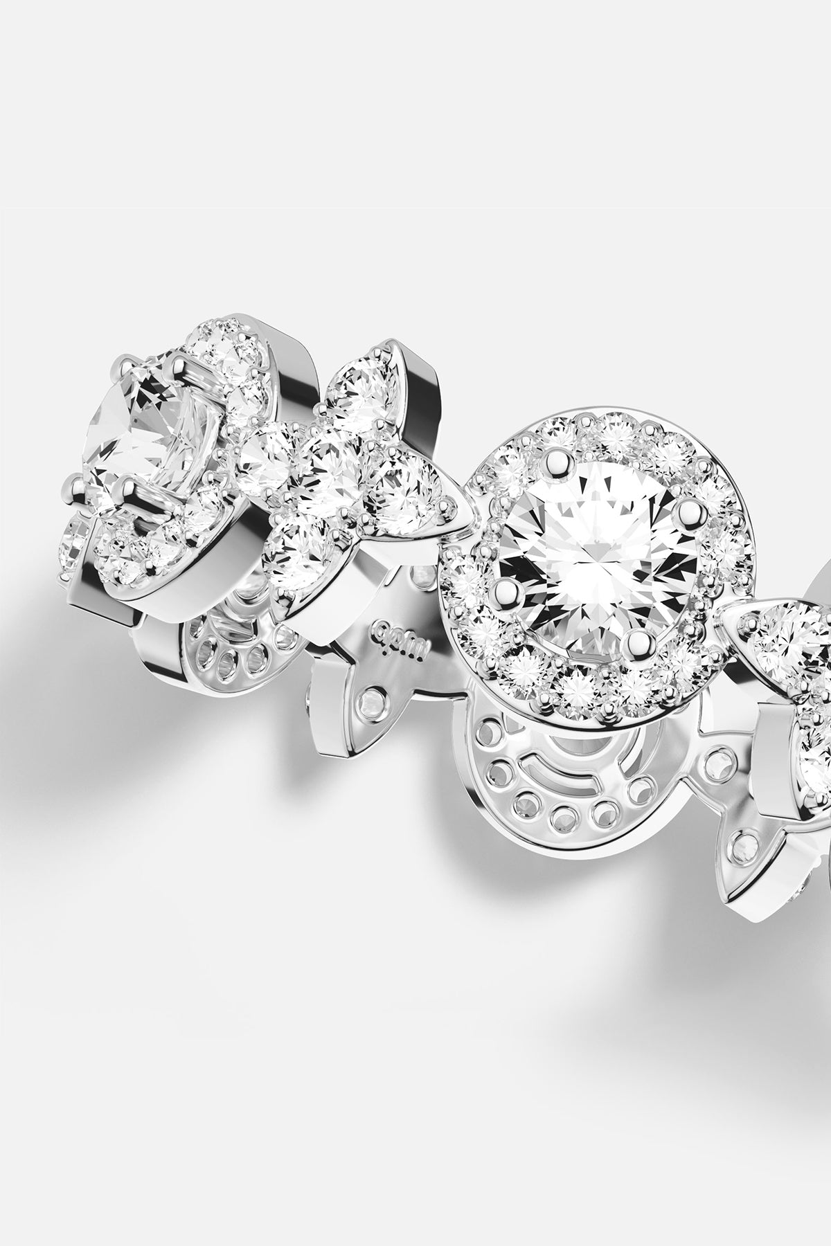 APM Ring in rhodium finish, a radiant cascade of brilliance and quiet elegance.