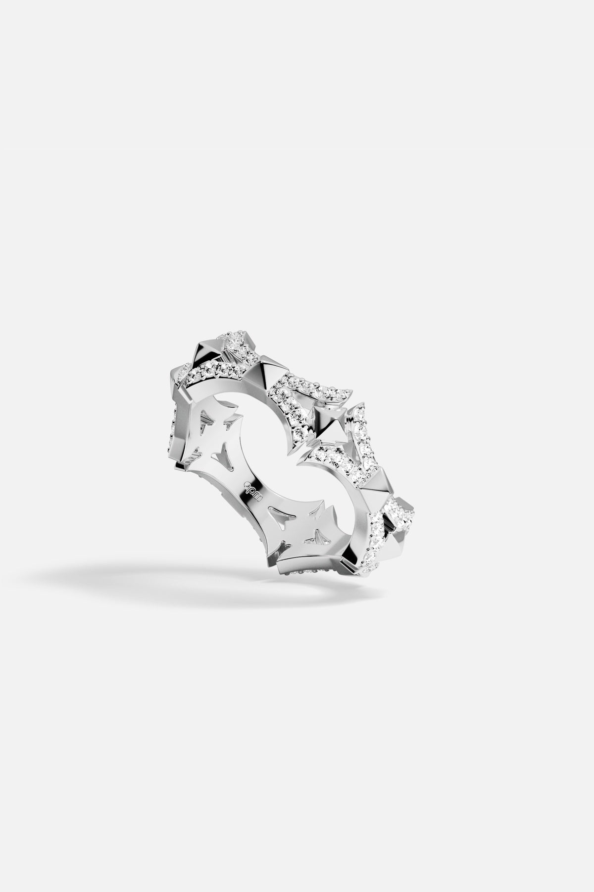 APM Ring with rhodium finish, sculpted edges shimmering with quiet, modern boldness.