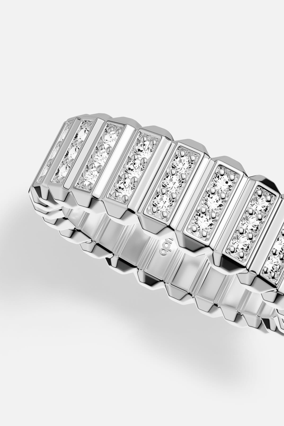 APM Ring in rhodium finish, sculpted lines and radiant sparkle for modern allure.