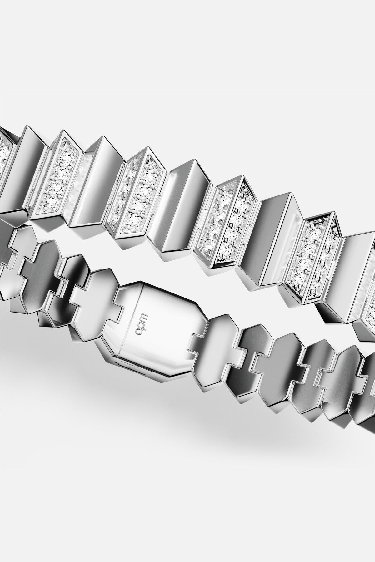 APM Bracelet in rhodium finish, architectural links shimmering with quiet modern edge.