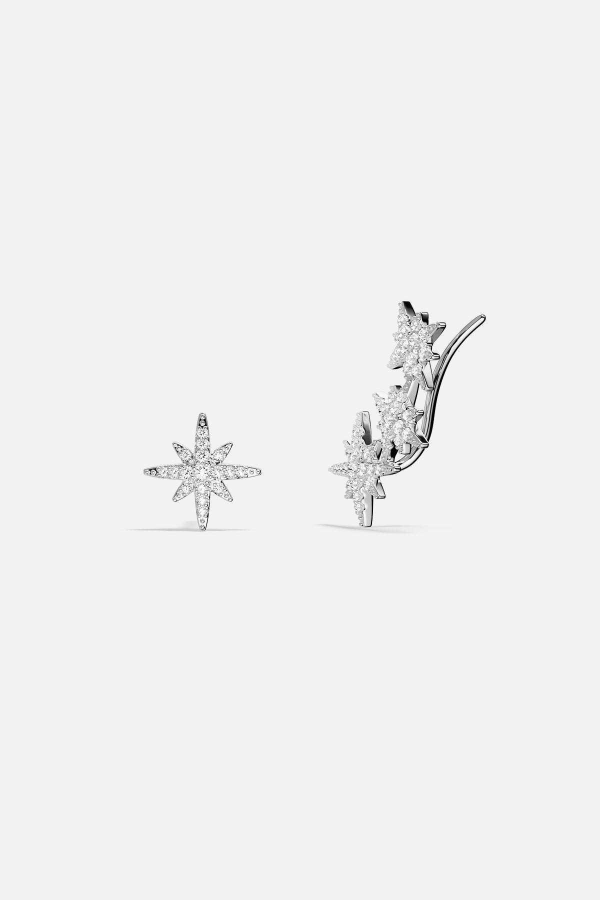APM Météorites Earrings, a celestial spark in luminous rhodium finish.